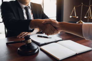  Lawyer and Client Shaking Hands